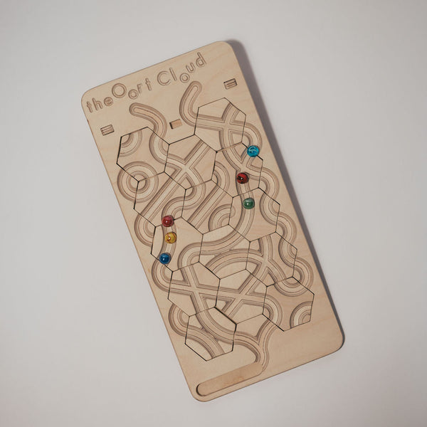 The Oort Cloud: A Marble Run Puzzle Game